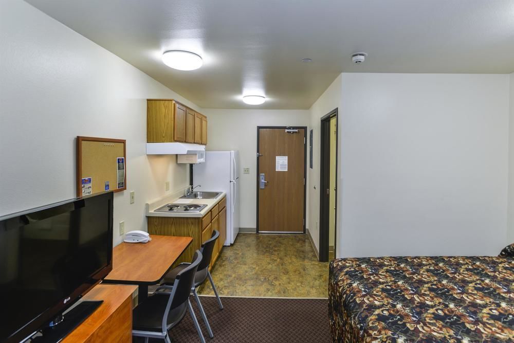 Woodspring Suites Conroe Exterior photo
