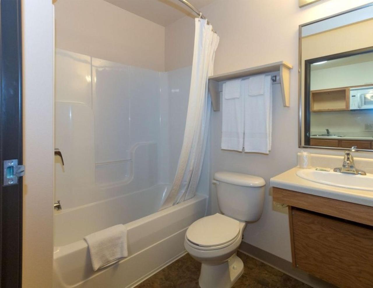 Woodspring Suites Conroe Exterior photo